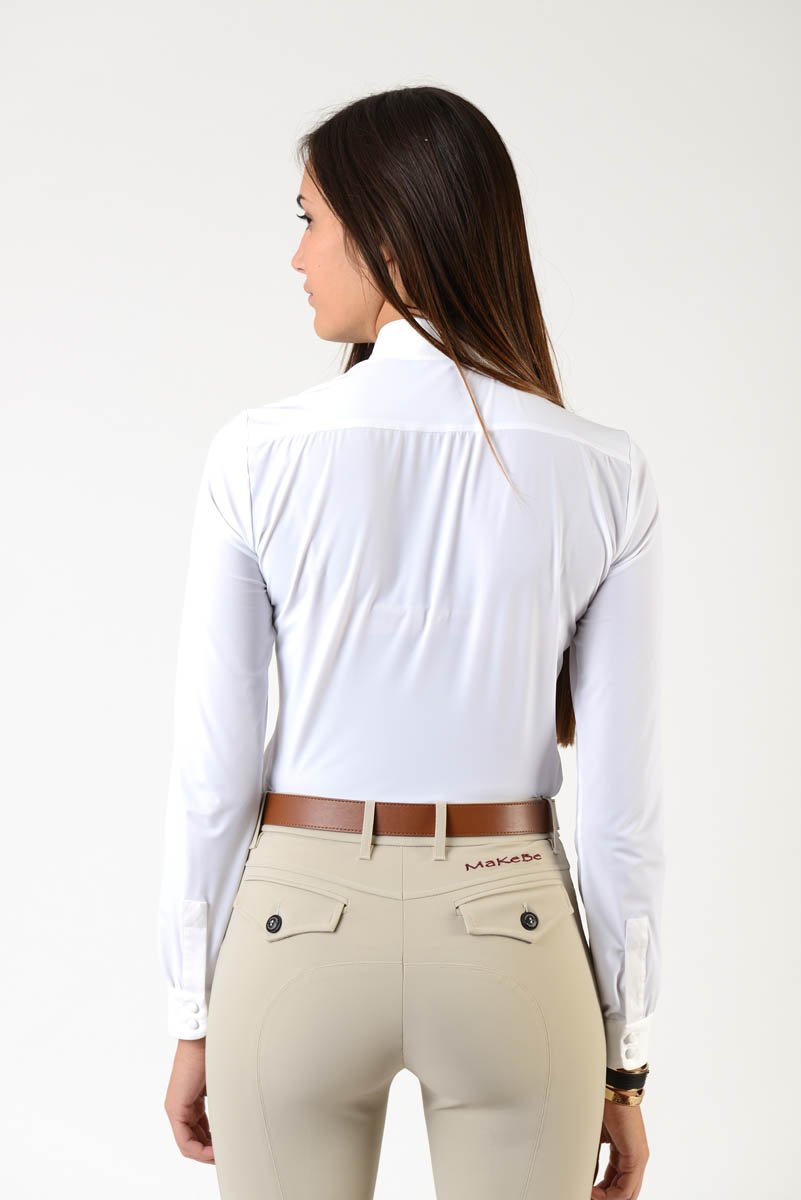 Ladies long sleeve shirt | model DAFNE | buttons | Ladies long sleeve polo shirt | lady long sleeve polo shirt | cotton | long sleeves polo shirt | long sleeves shirt | long sleeves riding polo | lady polo | lady riding shirt | riding shirt | ladies riding shirt | comfort of movement | Makebe | clothing | equestrian | riding | technical material | made in Italy | elegance | white |