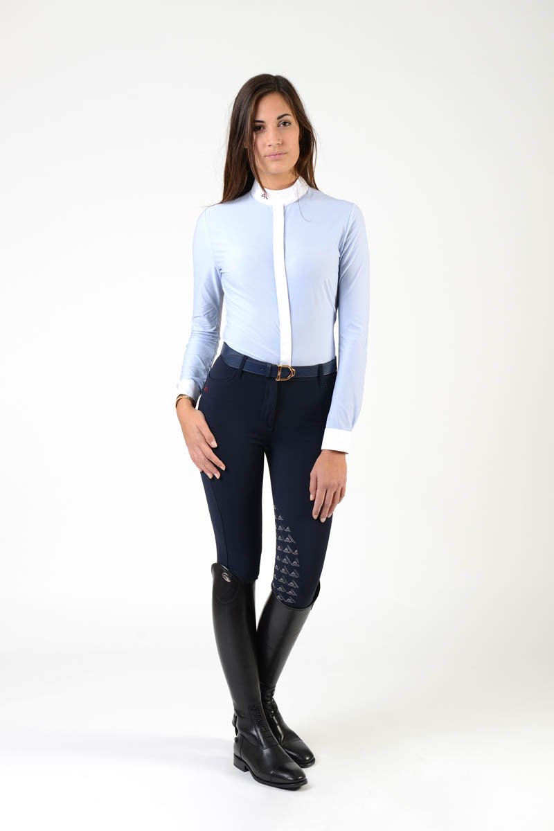 Ladies long sleeve shirt | technical fabric | lady long sleeve shirt | long sleeves shirt | long sleeves shirt | model SOFIA | long sleeves riding shirt | lady polo | lady riding shirt | riding shirt | ladies riding shirt | comfort of movement | Makebe | clothing | equestrian | riding | technical material | made in Italy | elegance | light blue |