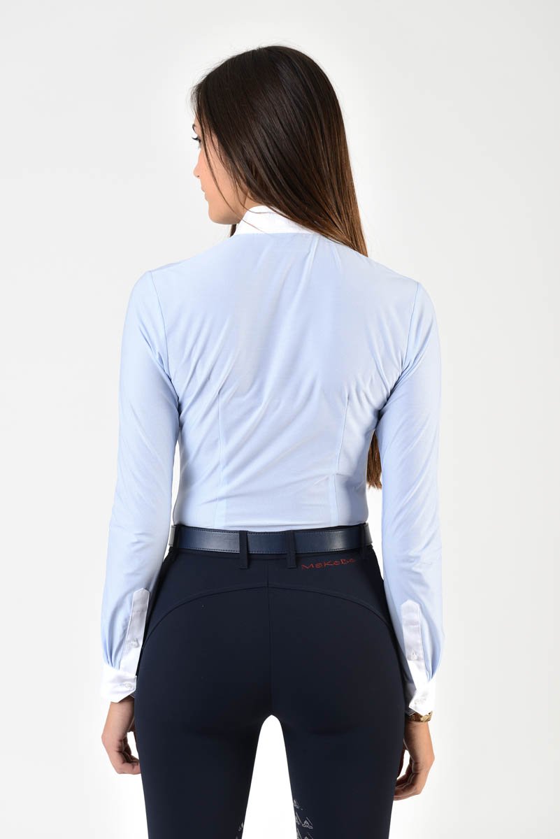Ladies long sleeve shirt | technical fabric | lady long sleeve shirt | long sleeves shirt | long sleeves shirt | model SOFIA | long sleeves riding shirt | lady polo | lady riding shirt | riding shirt | ladies riding shirt | comfort of movement | Makebe | clothing | equestrian | riding | technical material | made in Italy | elegance | light blue |